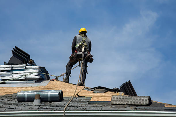 Professional Roofing technician working in Hamden, NY